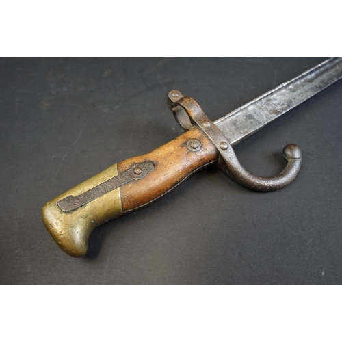 336 - A French World War One / WW1 era M1874 Gras Bayonet (St. Etienne, Fevier 1877) together with scabbar... 