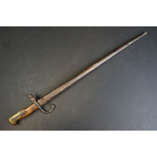 336 - A French World War One / WW1 era M1874 Gras Bayonet (St. Etienne, Fevier 1877) together with scabbar... 