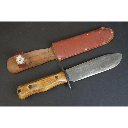 343 - A collection of three hunting / scouting sheath knives to include C. JUL. Herbertz of Rostfrei and J... 