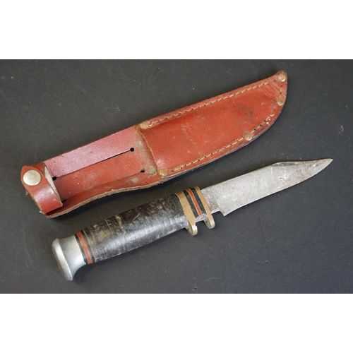 343 - A collection of three hunting / scouting sheath knives to include C. JUL. Herbertz of Rostfrei and J... 