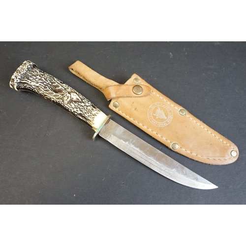 351 - A collection of three hunting / scouting sheath knives to include a William Rodgers example, all com... 