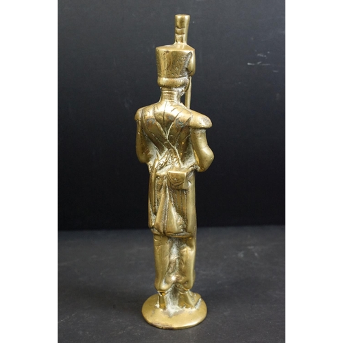 382 - A World War One / WW1 trench art vase made from a spent artillery shell together with a brass figure... 