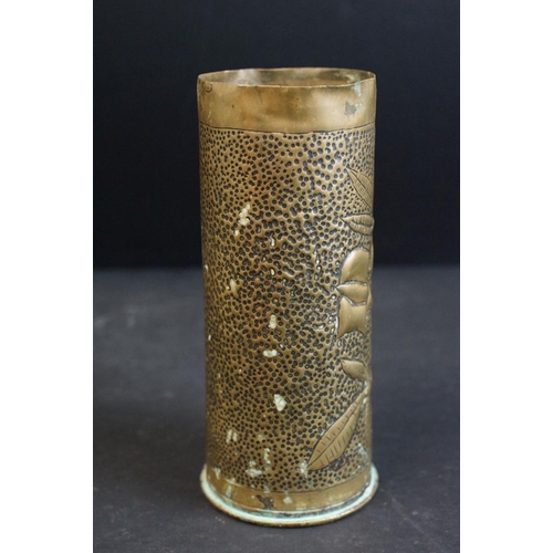 382 - A World War One / WW1 trench art vase made from a spent artillery shell together with a brass figure... 