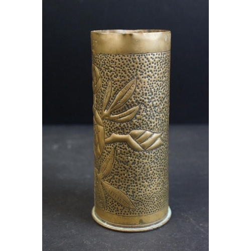 382 - A World War One / WW1 trench art vase made from a spent artillery shell together with a brass figure... 