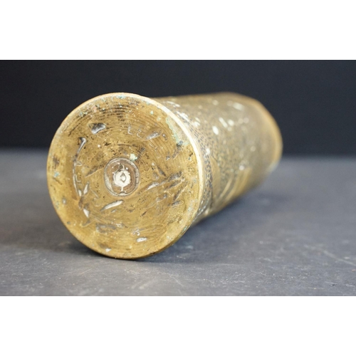 382 - A World War One / WW1 trench art vase made from a spent artillery shell together with a brass figure... 