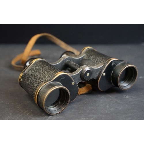 391 - A pair of World War Two / WW2 British military issued Kershaw binoculars, marked with the British br... 