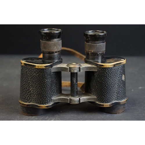 391 - A pair of World War Two / WW2 British military issued Kershaw binoculars, marked with the British br... 