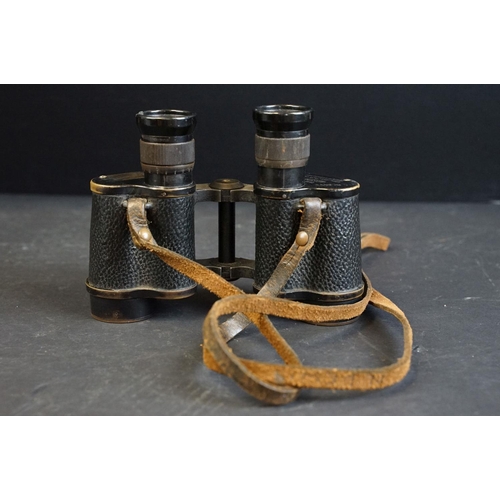 391 - A pair of World War Two / WW2 British military issued Kershaw binoculars, marked with the British br... 