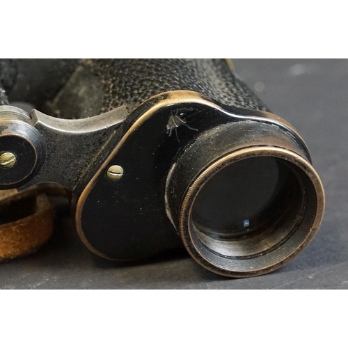 391 - A pair of World War Two / WW2 British military issued Kershaw binoculars, marked with the British br... 