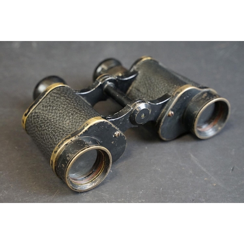 392 - A pair of World War Two / WW2 British military issued Kershaw binoculars, marked with the British br... 