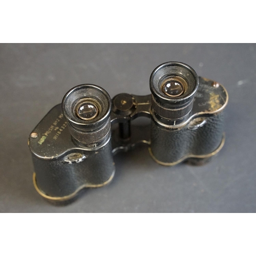 392 - A pair of World War Two / WW2 British military issued Kershaw binoculars, marked with the British br... 