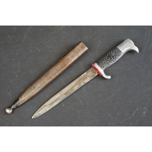 394 - Two World War Two / WW2 German paper knives to include a brass Kriegsmarine and a K98 dress dagger e... 