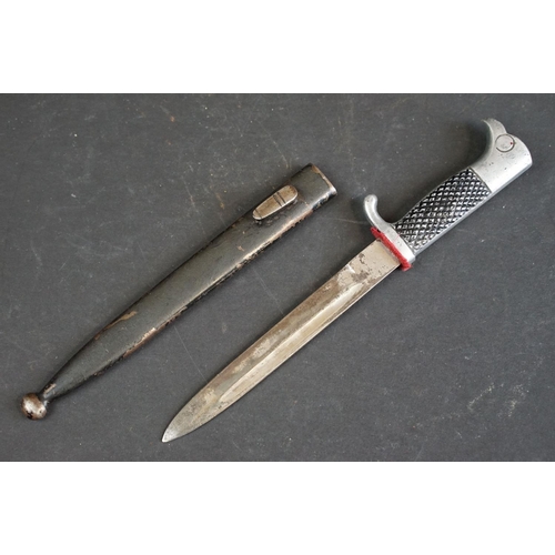 394 - Two World War Two / WW2 German paper knives to include a brass Kriegsmarine and a K98 dress dagger e... 