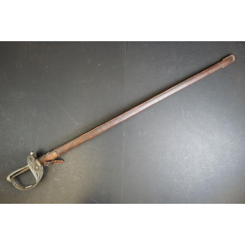 397 - A British 1822 pattern Coldstream guards officer sword complete with leather sheath (A/F)