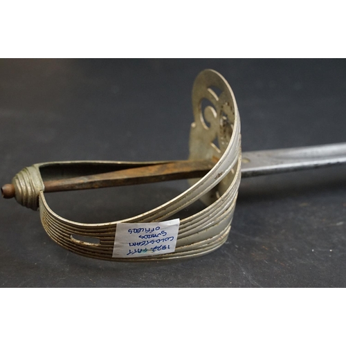 397 - A British 1822 pattern Coldstream guards officer sword complete with leather sheath (A/F)