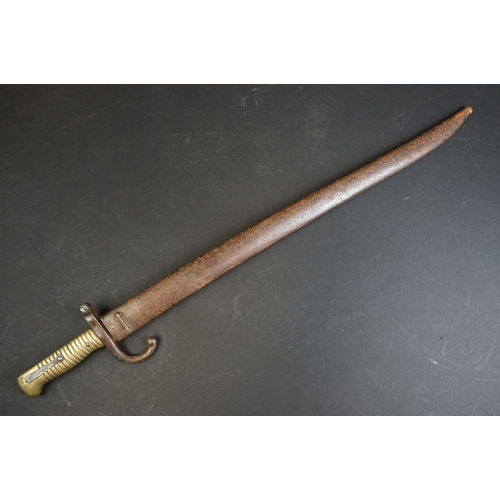 414 - A French Model 1866 Chassepot Bayonet, Dated 1873, of regulation type, the back edge with the date a... 