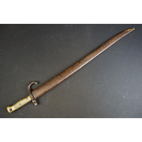 414 - A French Model 1866 Chassepot Bayonet, Dated 1873, of regulation type, the back edge with the date a... 