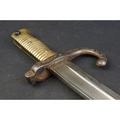 414 - A French Model 1866 Chassepot Bayonet, Dated 1873, of regulation type, the back edge with the date a... 