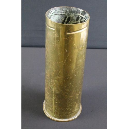 427 - A British inert 105mm brass artillery shell case engraved with the Falkland Islands.