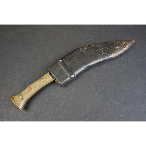 429 - A small kukri knife, steel single groove fuller balde, two piece horn riveted handle, blade length i... 