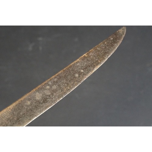 443 - A primative large machete type knife, overall length is approx 77cm.