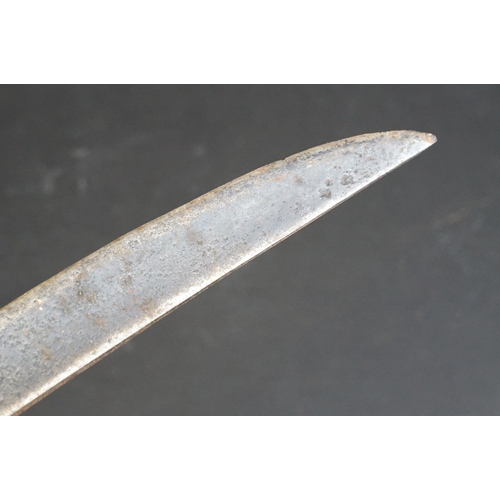 443 - A primative large machete type knife, overall length is approx 77cm.