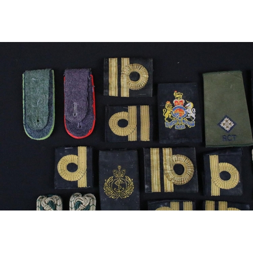 456 - A collection of mainly British and German medal ribbons and epaulettes.