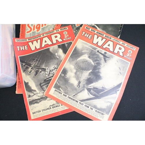 457 - A large collection of military related ephemera to include World War Two magazines (Signal, War..etc... 