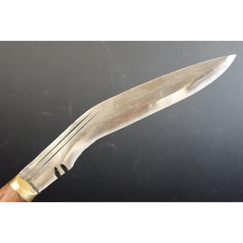 46 - A British Kukri knife (9th Gurkha Rifles), working / field knife, brass fittings with wooden handle,... 