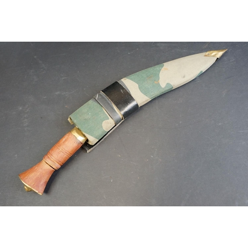 46 - A British Kukri knife (9th Gurkha Rifles), working / field knife, brass fittings with wooden handle,... 