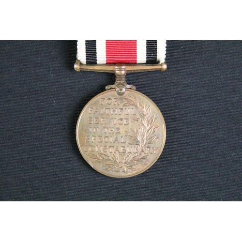 463 - A British full size World War Two / WW2 medal group of four to include the 1939-1945 Defence medal, ... 