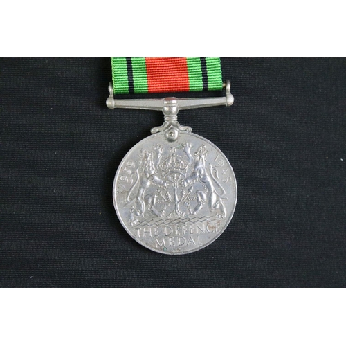 466 - A British full size World War Two / WW2 medal trio to include the 1939-1945 British War Medal, the 1... 