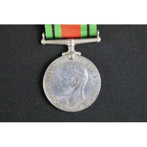 466 - A British full size World War Two / WW2 medal trio to include the 1939-1945 British War Medal, the 1... 