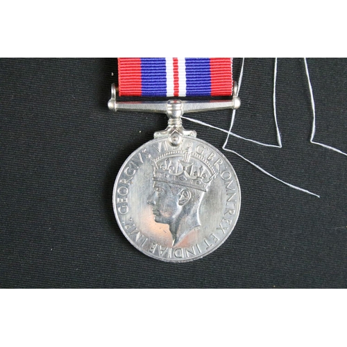 466 - A British full size World War Two / WW2 medal trio to include the 1939-1945 British War Medal, the 1... 