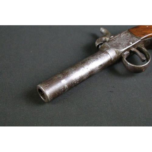 478 - A 19th Century Percussion Pistol. The pistol with a screw off barrel, fronting the mechanism engrave... 