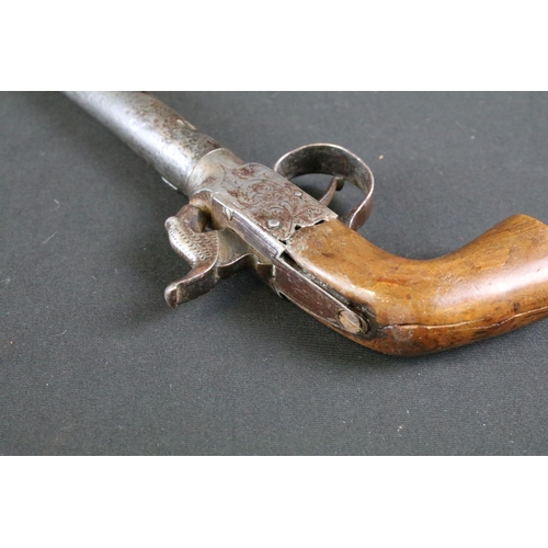 479 - A 19th Century Percussion Pistol. The mechanism engraved with scrolled floral decoration. The trigge... 