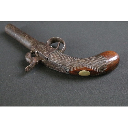 480 - A 19th Century Percussion Pistol. The mechanism engraved with scrolled floral decoration. The trigge... 