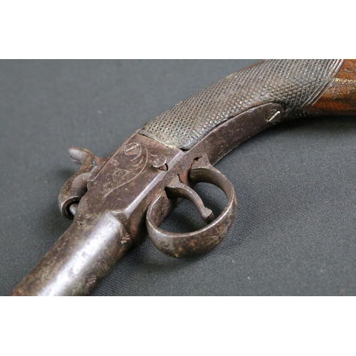 480 - A 19th Century Percussion Pistol. The mechanism engraved with scrolled floral decoration. The trigge... 