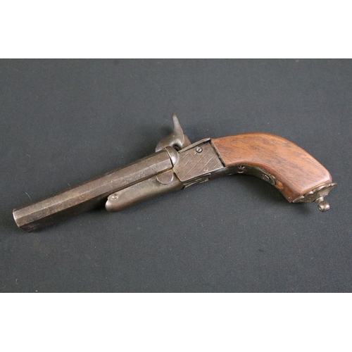 481 - A 19th Century double barrel Percussion Pistol. The pistol with double barrel, fronting the mechanis... 