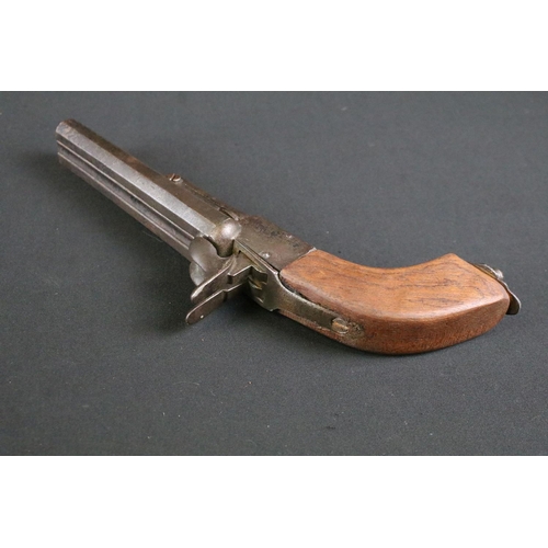 481 - A 19th Century double barrel Percussion Pistol. The pistol with double barrel, fronting the mechanis... 