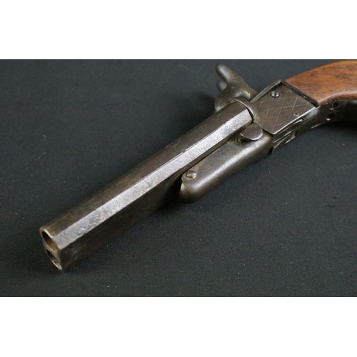 481 - A 19th Century double barrel Percussion Pistol. The pistol with double barrel, fronting the mechanis... 