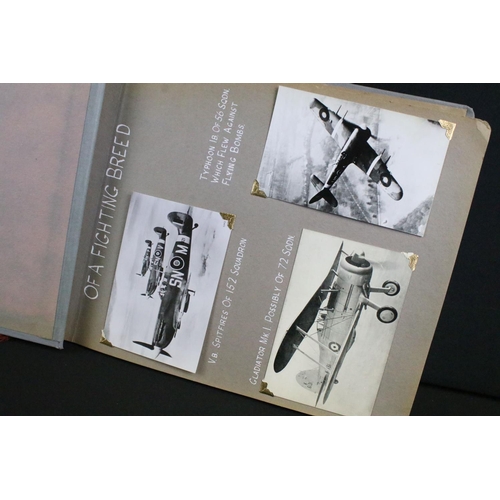 483 - A World War Two / WW2 era photograph postcard album contained original press photographs, photograph... 