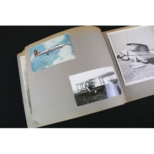 483 - A World War Two / WW2 era photograph postcard album contained original press photographs, photograph... 