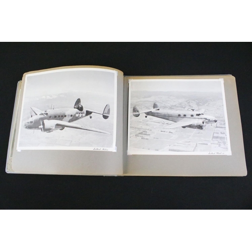 483 - A World War Two / WW2 era photograph postcard album contained original press photographs, photograph... 