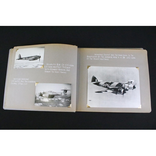 483 - A World War Two / WW2 era photograph postcard album contained original press photographs, photograph... 