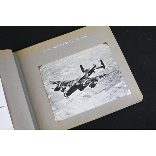 483 - A World War Two / WW2 era photograph postcard album contained original press photographs, photograph... 