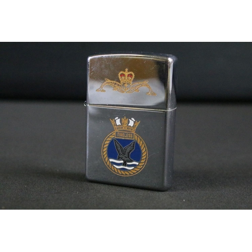 488 - A collection of three British Royal Navy souvenir Zippo lighters to include HMS Minerva, HMS Tireles... 