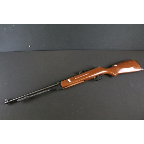 515 - A vintage Cal.177 air rifle together with boxed rifle scope.