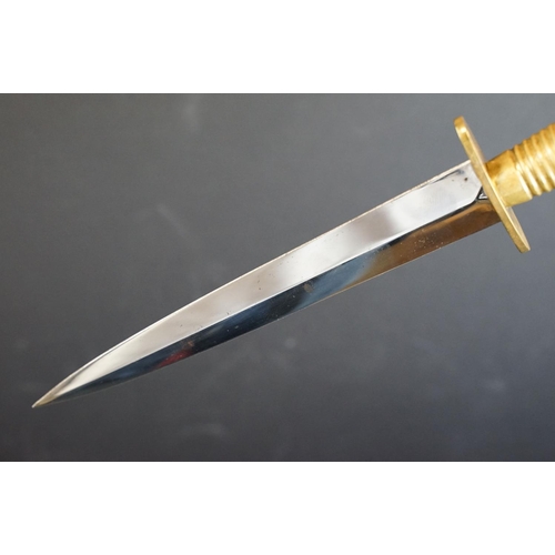 53 - An Eggington Brothers William Rodgers Commemorative Fairbairn-Sykes Commando Dagger, 17.7cm mirror p... 