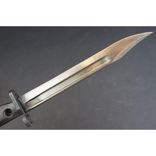 55 - A British military issued L1A1 bayonet, broad arrow mark to blade, black handle / grip, complete wit... 